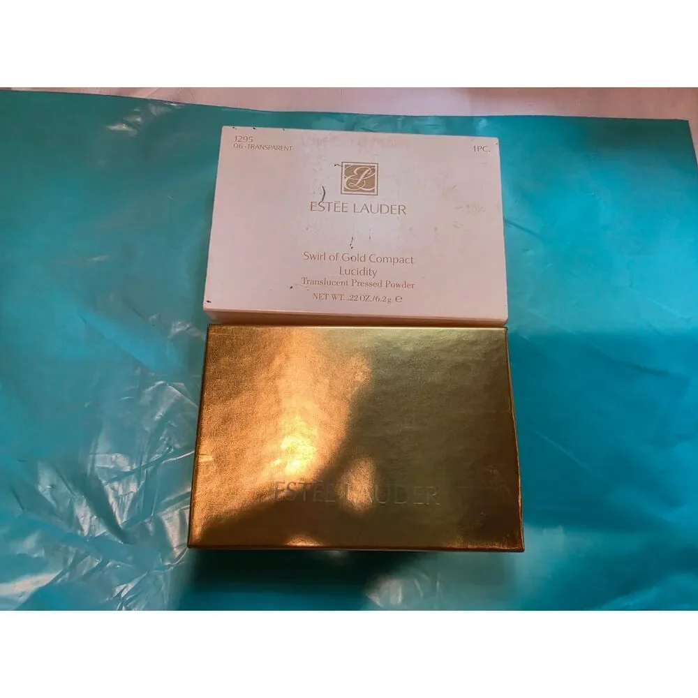 1990's Estee Lauder Lucidity Swirl of Gold 